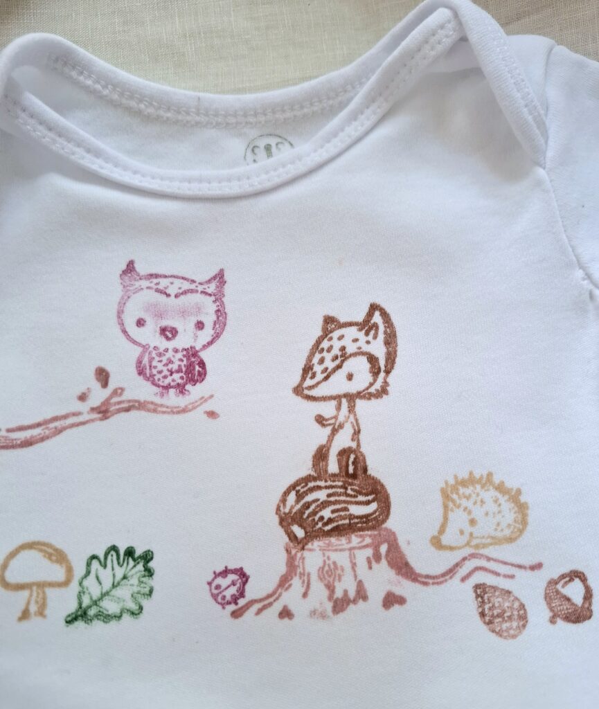 Babybody gestempelt mit Tiere